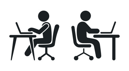 Two people working on laptops at desks