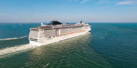 Cruise ship vacation. Travel at sea. Aerial drone view luxury liner. Ship leaving Miami port....