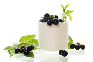 Sweet homemade yogurt with berries on white background