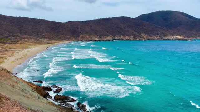 Panoramic view of wild beach and turquoise sea in Tayrona National Natural Park, Colombia