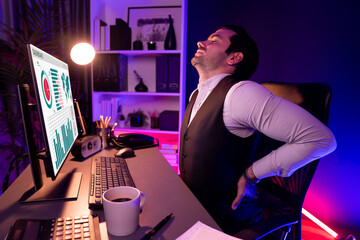 Smart businessman having aches with body in back, neck and whole body, stretching composition....