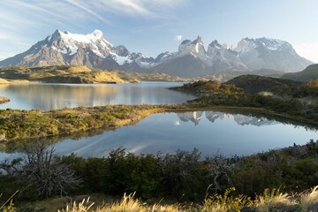 Torres del Paine mountains reflected in a lake.