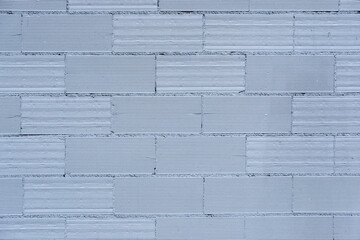 Background from a wall made of gray painted bricks