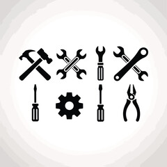 Obraz premium Collection of black silhouette tools including hammer wrenches screwdrivers gear and pliers