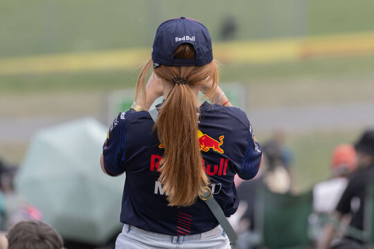 Spielberg, Austria: Formula 1 Red Bull Racing fan in a red shirt and a red cap on the Red Bull Ring Race track during the Austrian Grand Prix