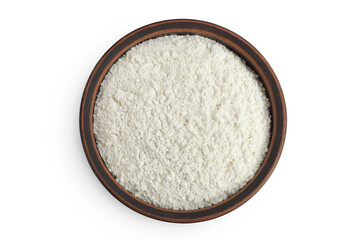 White flour in ceramic bowl isolated on white background. Top view. Flat lay.