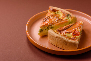 Quiche, salmon pie, broccoli, cheese. Quiche tart with fish and vegetables, cheese