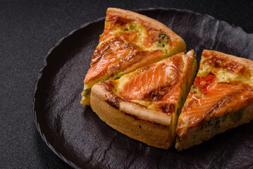 Quiche, salmon pie, broccoli, cheese. Quiche tart with fish and vegetables, cheese