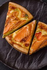Quiche, salmon pie, broccoli, cheese. Quiche tart with fish and vegetables, cheese