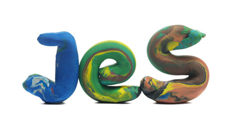 Colorful modelling clay in shape word yes, plasticine isolated on white background, side view