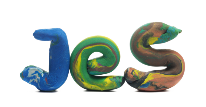Colorful modelling clay in shape word yes, plasticine isolated on white background, side view