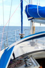 Sailboat Deck Detail with Mast and Open Sea Background