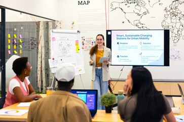 Business meeting with coworkers on urban mobility solutions