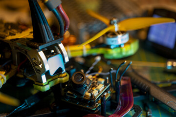 Close-up view components assembly 5-inch FPV drone yellow propeller circuit board elements visible