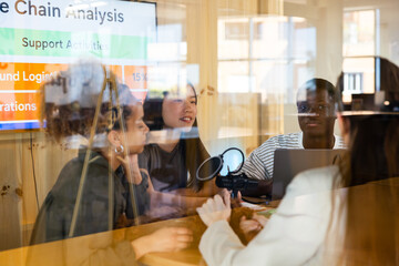 Team collaboration in modern office meeting room