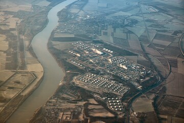 Oil refinery and silos aerial view from airplane
