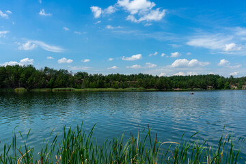 The abandoned Korostyshiv quarry, with its deep blue waters and rugged cliffs, has become a scenic...