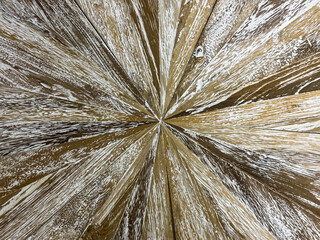 Natural wood texture background featuring radial patterns and earthy tones, showcasing the beauty of organic materials in a harmonious design