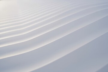 Obraz premium Wavy architecture captures unique shadows, showcasing an abstract white structure with a dynamic, minimalist and modern design element.