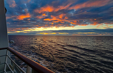 wonderful view of the sea from a cruise ship at sunset with sea and sun
