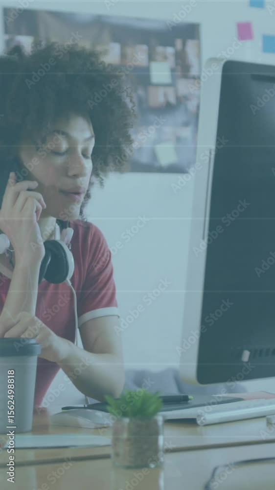 Aufkleber animation of financial data processing over businesswoman using computer