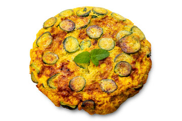 Omelette with sliced zucchini and mint leaves isolated