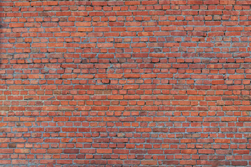Close-up texture of the old red brick wall. Abstract close-up brick wall background.