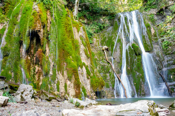 Scenic view of the twin waterfalls in Faedis, located in the forested hills of northeastern Italy....