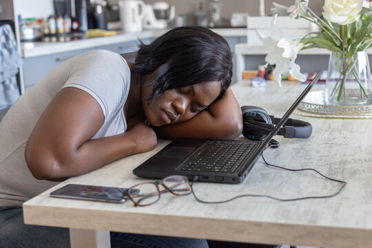 burnout, tired woman student sleeping near computer laptop