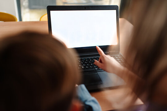 Child watching over online grocery shopping