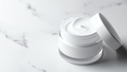 Luxury face cream jar on marble background
