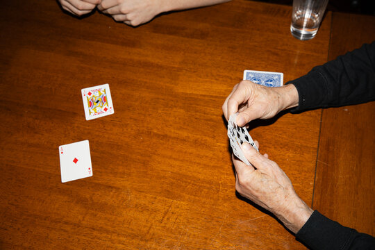hands playing card game