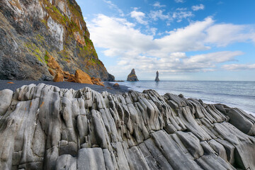 Impressive landscape with basalt rock formations Troll Toes on Black beach Reynisfjara near the...