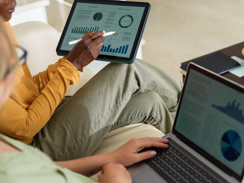 Businesswomen analyzing business performance