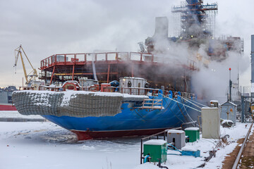 Construction of an icebreaker at a shipyard.