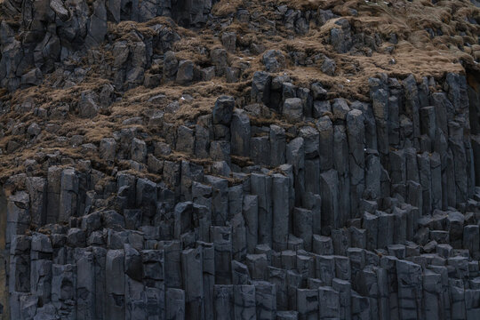 Basalt Rock Column Formation with Dry Grass
