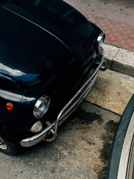 Italian Vintage Black Car with Chrome Accents