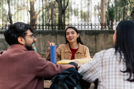 Group of students having breakfast after classes.