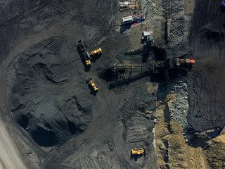 An aerial view of a large coal quarry.