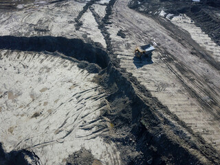 An aerial view of a large coal quarry.