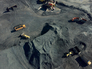 Open-pit coal mining in a large quarry.
