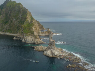 Aerial view of an abandoned old lighthouse.