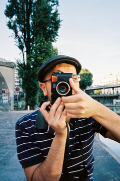 Urban Photographer with Vintage Camera