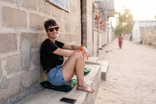 Tourist relaxing in Senegal, Africa, enjoying the local atmosphere