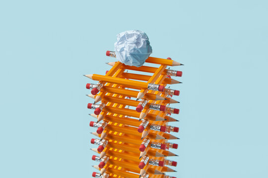 Pencil tower used as bin with crumpled paper