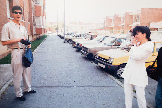Analog portrait of woman taking a photo