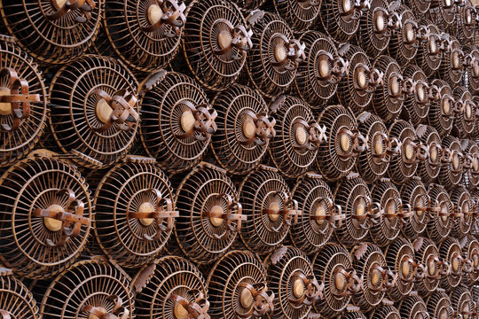 Closeup of a background wall made of wooden bird cages