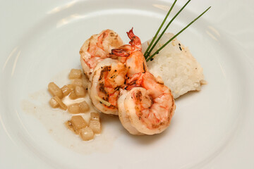 Grilled Shrimp with Rice Garnish Elegant Presentation Delicious Gourmet Dish