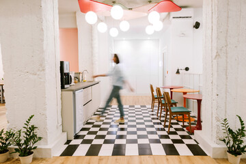 Bright, modern space with checkerboard flooring in the office 