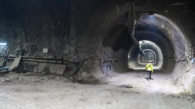 engineer checks underground subway tunnel